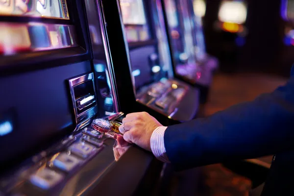 A laptop glowing with a bright login prompt in a minimalistic setup, symbolizing the protected access system at KU9.